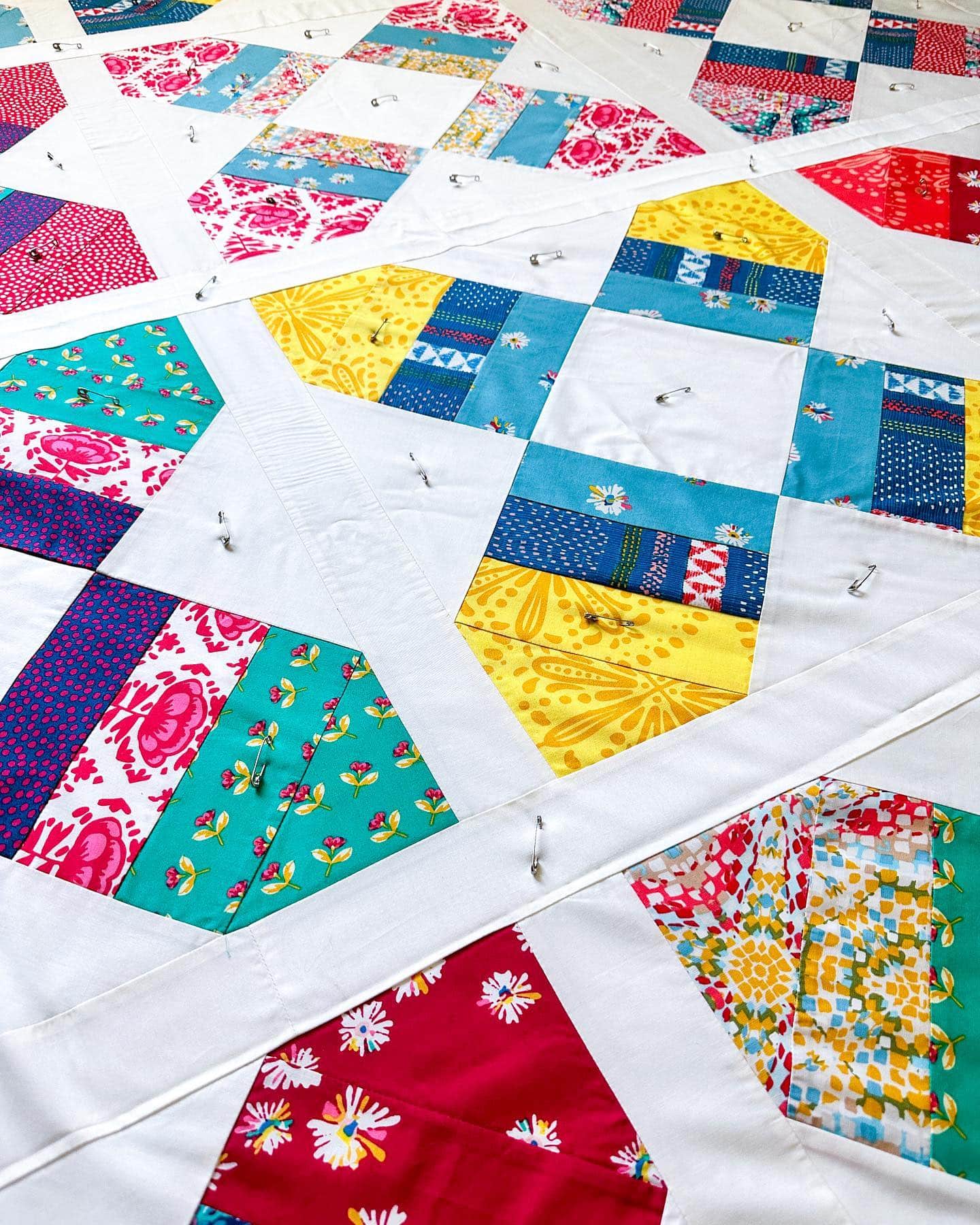 I haven’t been sewing as much as I’d hoped this summer, but I’ve been having the best time with my littles. 

I did manage to piece this #SpringtideQuilt for another of my daughter’s preschool teachers. And of course forgot to take progress shots along the way except for this basting shot. Here’s hoping I get it quilted before I head back to work next week🤞

Pattern: Springtide by me!
Fabric: Sun Kissed by @maureencracknell for @artgalleryfabrics found in my stash