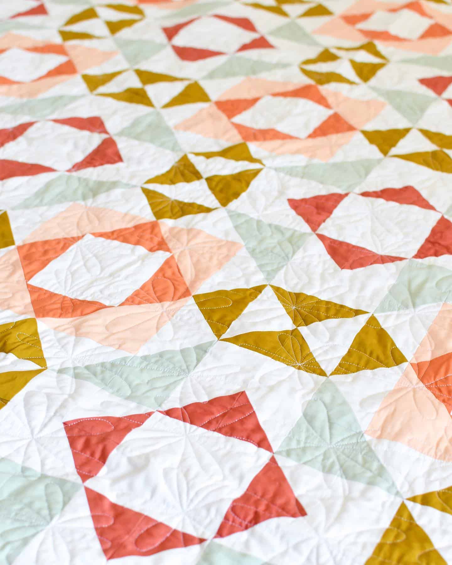 I finally finished up the Lava Blooms quilt I made during the sew along last year! 🤦🏻‍♀️ Emily @browneyedquilter quilted the sweetest daisy panto on it! This one will be going to my daughter's daycare/preschool teacher as a thank-you gift before she heads off to kindergarten 😭 
 
I searched my fabric stash and was able to restock a small amount of these Lava Blooms Quilt Kits using AGF solids. 

Plus today is the last day to get 20% off my entire shop!! Sale ends at midnight! No code needed 🤗

#summersale #quiltingsale #quiktkits #lavabloomsquilt #sylviaraschellapatterns #sylviaraschellaquilts #fabricsale #patternsale #quiltfinish #lavabloomsquiltsa